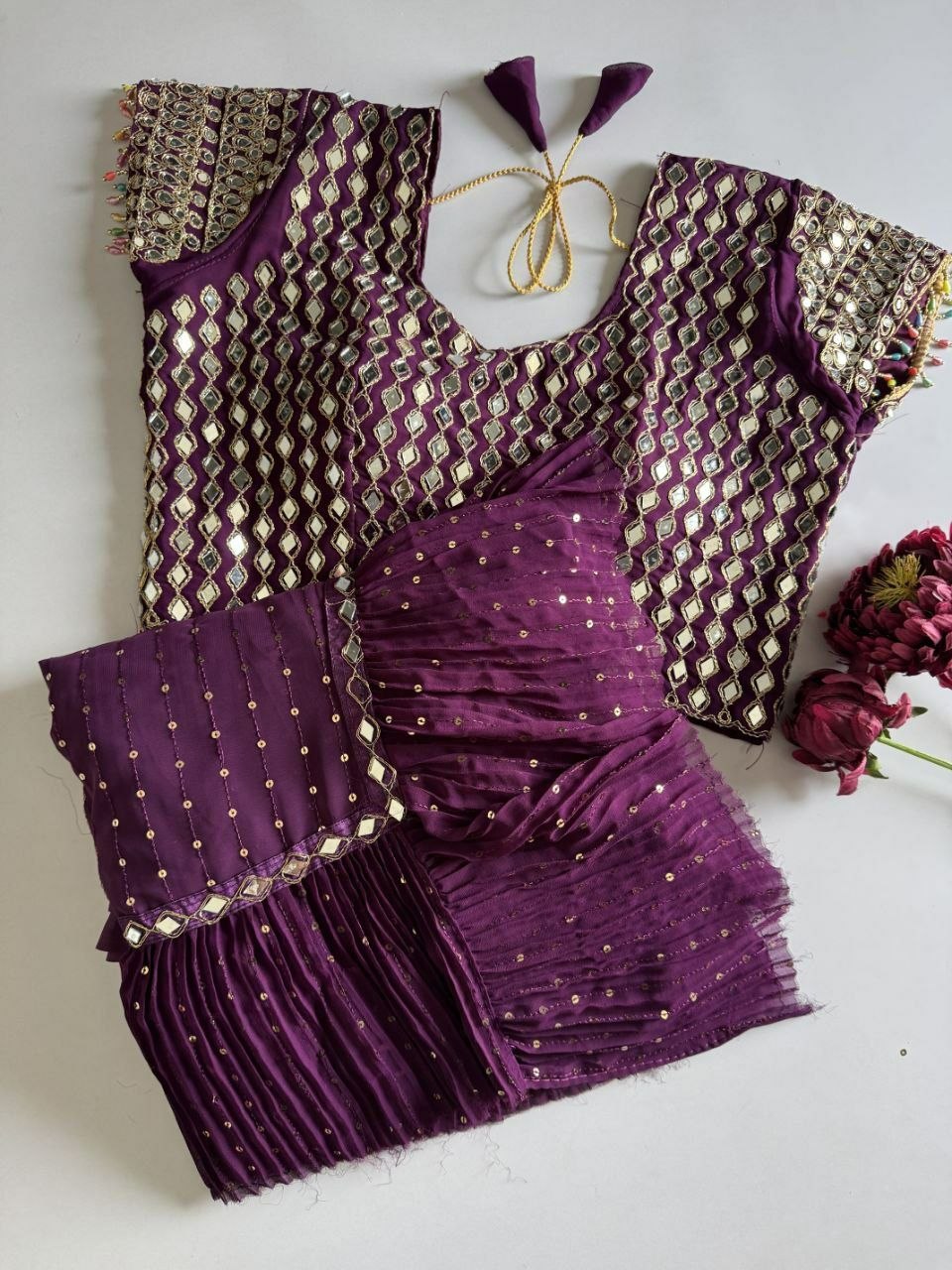 Saree with pleats and stitched blouse