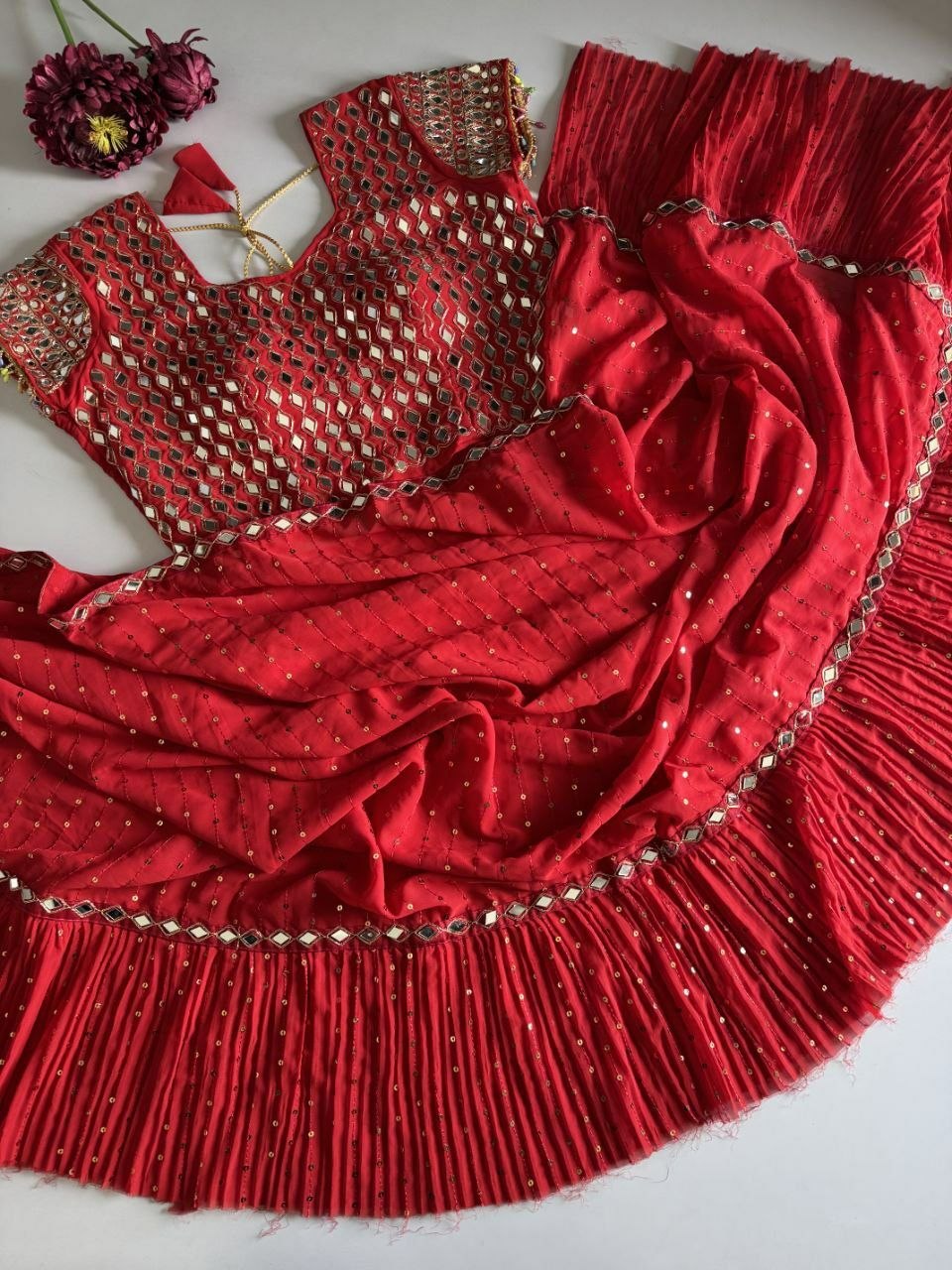 Saree with pleats and stitched blouse