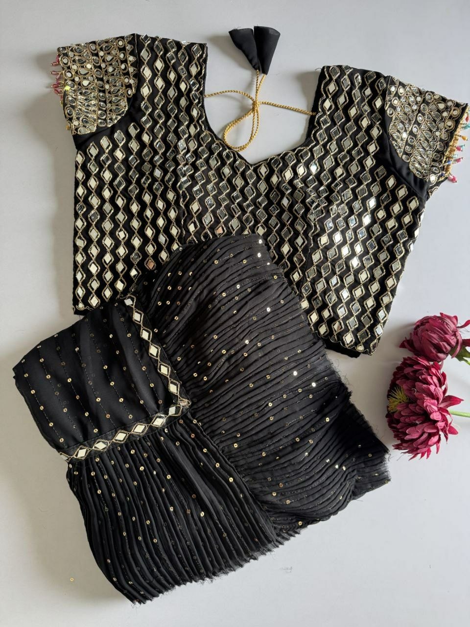 Saree with pleats and stitched blouse